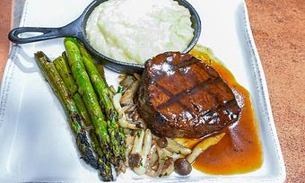 Product: Adobo demi-glace, forest mushrooms, mashed potato with roasted garlic, and wood-grilled asparagus spears - Tonto Bar & Grill in Rancho Manana - Cave Creek, AZ American Restaurants