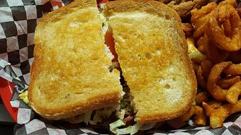 Product: Bacon, lettuce and tomato on sourdough bread - Trio Bar & Grill in Enderlin, ND American Restaurants