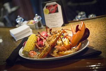 Product: Lobster doesn't get any fresher than at Trio!  Our lobsters are flown in from Maine every Monday for our Lobster Boil on Monday Nights!  1 1/4 pound lobster, boiled potatoes, corn on the cob and coleslaw.  Just $29.95. - Trio Bistro in Kenwood - Cincinnati, OH American Restaurants