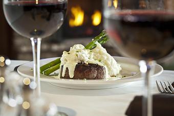 Product: Come in, sit by the fire and enjoy a glass of wine and an 8oz. filet mignon - Trio Bistro in Kenwood - Cincinnati, OH American Restaurants