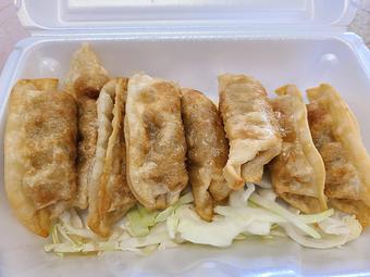 Product: Fried pot stickers (pork dumplings) - Tsing Tsao Chinese Fast Food in Des Moines, IA Chinese Restaurants