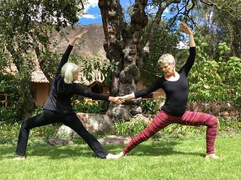 Product: Denise Zondervan and Daryl Allison-Busch at Willka Tika, Peru, partner in Virabhadrasana variation (Dancing Warrior) - Union Yoga in Leland MI - Leland, MI Yoga Instruction