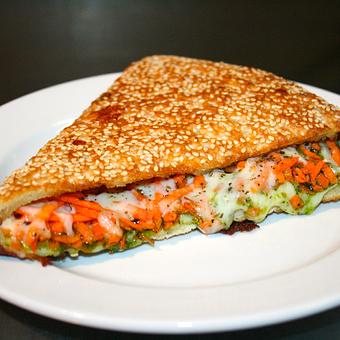 Product: Vegetarian Sicilian Muffaletta with carrots, pesto, cheese, and italian spices - Upper Crust Pizza & Pasta in Westside Santa Cruz - Santa Cruz, CA Pizza Restaurant