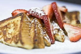 Product: Topped with Powdered Sugar and Choice of Pecan Maple Syrup, Blueberry Compote, Apple Compote or Fresh Strawberries - Virginia's On King in Historic Downtown Charleston - Charleston, SC American Restaurants