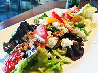 Product: strawberries, pecans, dried apricots, goat cheese, artisan greens
basil-honey-pecan oil vinaigrette - Wahoo! Grill in Decatur / Oakhurst / Atlanta - Decatur, GA Seafood Restaurants