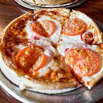 Product - Wig & Pen Pizza Pub in Iowa City, IA Pizza Restaurant