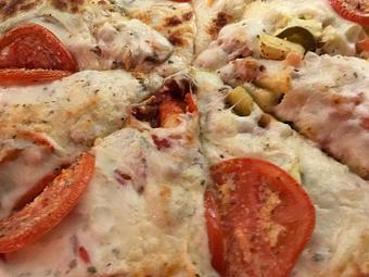 Product - Wig & Pen Pizza Pub in Iowa City, IA Pizza Restaurant