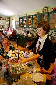 Product: Emily serves a tower of treats at the Harry Potter High Tea. - Wildflowers Tea Room in Broomfield, CO Irish Restaurants