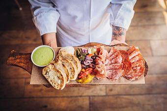 Product: Charcuterie Board "Antipasto" with Prosciutto, Salami, Sopressata, Artisan Cheese, for the table - Wolfgang Puck Bar & Grill in Downtown LA/LA Live - Los Angeles, CA American Restaurants