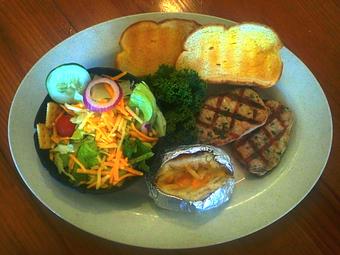 Product: Pork Chop Dinner - Woody's Bar-B-Q in Macclenny, FL Barbecue Restaurants