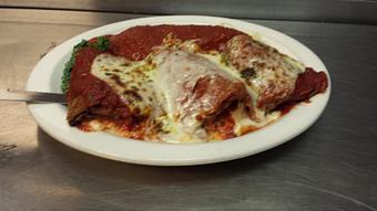 Product: Stuffed eggplant, so yummy! - Yianni's Restaurant & Bar in Gates Center - Rochester, NY Italian Restaurants