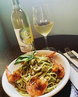 Product: Creamy Arugula Pesto Pasta with Linguine finished with fresh Basil and grated Parmesan. - Zin Zen Wine Bistro in Adriatica Village/Stonebridge Ranch - McKinney, TX American Restaurants