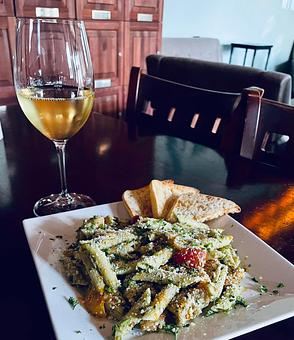 Product: Chilled Penne Pasta tossed with our house made basil pesto, cherry tomatoes, red onions, grilled shrimp and topped with fresh parmesan cheese. - Zin Zen Wine Bistro in Adriatica Village/Stonebridge Ranch - McKinney, TX American Restaurants