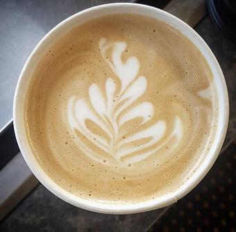Product: Roadhouse Latte with foam art - Zingerman's Roadhouse in Ann Arbor, MI American Restaurants