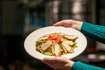 Product: Grilled 6oz chicken breast, organic mixed greens and dried
cranberries tossed in honey lime vinaigrette, topped with peanut sauce and crispy wontons. - Midtown Cafe in Nashville, TN American Restaurants Product: Grilled 6oz chicken breast, organic mixed greens and dried
cranberries tossed in honey lime vinaigrette, topped with peanut sauce and crispy wontons. - Midtown Cafe in Nashville, TN American Restaurants