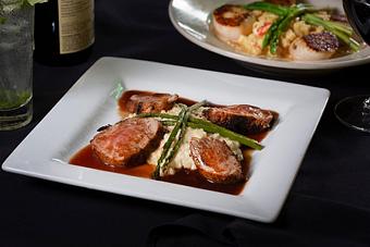 Product: Marinated & dry rubbed Memphis style, served with mushroom risotto,
grilled asparagus, and cherry demi. - Midtown Cafe in Nashville, TN American Restaurants Product: Marinated & dry rubbed Memphis style, served with mushroom risotto,
grilled asparagus, and cherry demi. - Midtown Cafe in Nashville, TN American Restaurants