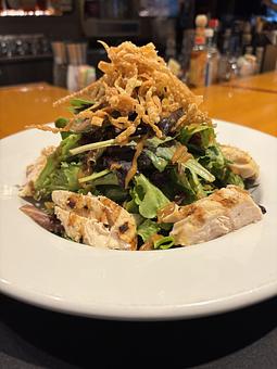 Product: Grilled 6oz chicken breast, organic mixed greens and dried
cranberries tossed in honey-lime vinaigrette, topped with peanut sauce and crispy wontons. - Midtown Cafe in Nashville, TN American Restaurants Product: Grilled 6oz chicken breast, organic mixed greens and dried
cranberries tossed in honey-lime vinaigrette, topped with peanut sauce and crispy wontons. - Midtown Cafe in Nashville, TN American Restaurants