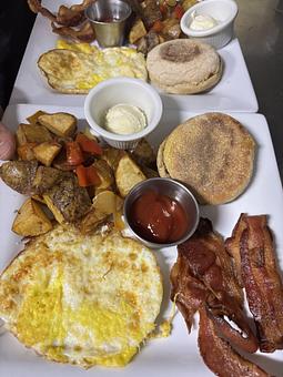 Product: Two eggs any way and choice of applewood smoked bacon, Swaggerty’s
mild country sausage, turkey sausage or black forest ham. - Midtown Cafe in Nashville, TN American Restaurants Product: Two eggs any way and choice of applewood smoked bacon, Swaggerty’s
mild country sausage, turkey sausage or black forest ham. - Midtown Cafe in Nashville, TN American Restaurants