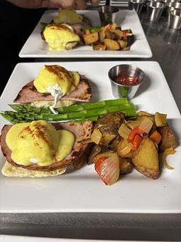 Product: Biscuit or English Muffin with Black Forest Ham, Poached Eggs,
topped with Hollandaise. - Midtown Cafe in Nashville, TN American Restaurants Product: Biscuit or English Muffin with Black Forest Ham, Poached Eggs,
topped with Hollandaise. - Midtown Cafe in Nashville, TN American Restaurants