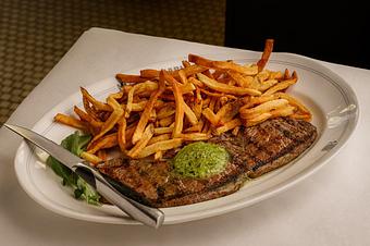 Product: Grilled steak frites with maître d'hôtel butter and hand-cut fries - Mon Ami Gabi in Bethesda, MD French Restaurants
