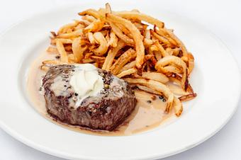 Product: Filet mignon frites with peppercorn sauce and hand-cut fries - Mon Ami Gabi in Bethesda, MD French Restaurants