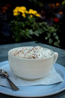 Product: Shot of espresso, steamed milk and a touch of vanilla. Topped with whipped cream and a sprinkle of cinnamon. 4.75 - Nikolas Pizza in Newport, RI Pizza Restaurant