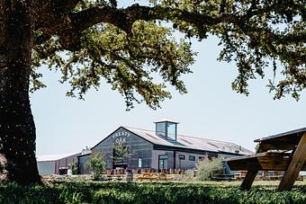 Exterior: Treaty Oak Distilling - Alice's Restaurant at Treaty Oak Distilling in Dripping Springs, TX American Restaurants