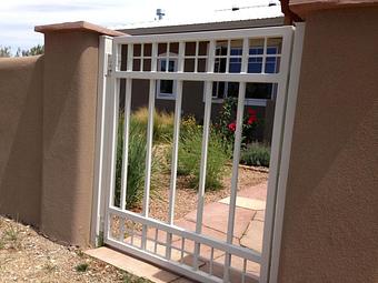 Exterior: Our white gates will not weep orange - Amazing Gates of America in Albuquerque, NM Business Services