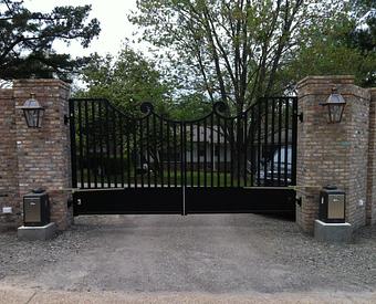 Exterior: Custom Gate with Articulated Arm Gate Operators - Amazing Gates of America in Albuquerque, NM Business Services