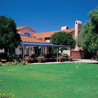Exterior: Audubon Bar Patio - Arizona Inn - Dining Room in Blenman Elm - Tucson, AZ American Restaurants