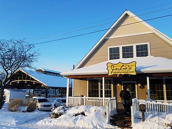 Exterior: Visit us at our warm coffee cottage in beautiful downtown South Haven. - Cafe Julia in South Haven, MI Bakeries