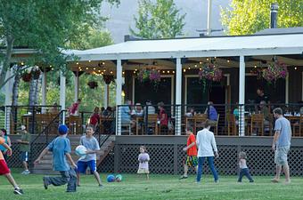 Exterior: Kids on our lawn - Calico Restaurant and Bar in Wilson, WY American Restaurants