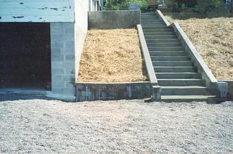 Exterior: finished concrete block wall / concrete walls / concrete stairs and block retaining wall - Eddie's Masonry in Port Byron, NY Masonry & Bricklaying Contractors