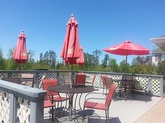 Exterior: Enjoy a meal or cocktails outside on our patio! - Flat Creek Restaurant & Saloon in Hayward, WI American Restaurants