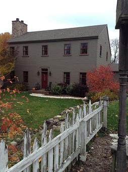 Exterior: A wonderful saltbox style house with the following rooms. - Just A Little Bit Country & Log Cabin Hooked Rugs in Waukesha, WI Cabins Cottages & Chalet Rental