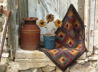 Exterior: Log cabin hooked rugs are reproductions of "early" 1800's style rugs, - Just A Little Bit Country & Log Cabin Hooked Rugs in Waukesha, WI Cabins Cottages & Chalet Rental