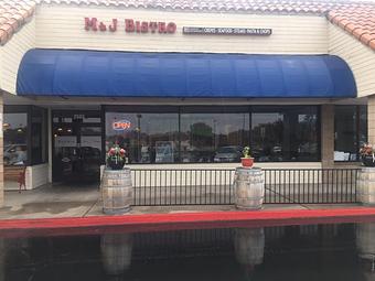 Exterior: self parking for more than 100 vehicles, maximum restaurant occupancy 60-80 guests - M & J Bistro in Tracy, CA American Restaurants