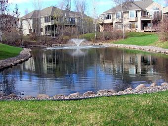 Exterior: Natural Pond Installation with Water Feature - Maple Crest Landscape in Medina, MN Candy & Confectionery