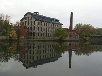Exterior: The Seneca Falls Knitting Mill, due for some renovation. - Mid-Lakes Navigation Company in Skaneateles, NY Business Services