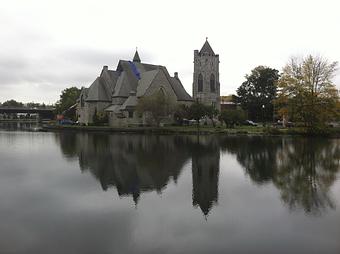 Exterior: Trinity Church, near Seneca Falls is among the prettiest you will see on the canal.  A church spire is often the first thing you see as you approach a town from the water. - Mid-Lakes Navigation Company in Skaneateles, NY Business Services