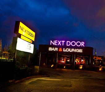 Exterior: NextDoor 7 - Next Door Bar and Lounge in Houston, TX Drinking Establishments