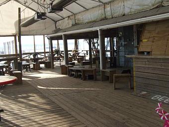 Exterior: Outside covered deck - Pirates Cove in Josephine, AL - Elberta, AL American Restaurants