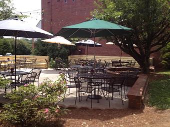 Exterior: patio expansion - Sir Edmond Halley's in Myers Park - Charlotte, NC Hamburger Restaurants