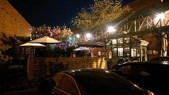 Exterior: Night time on the patio - Sir Edmond Halley's in Myers Park - Charlotte, NC Hamburger Restaurants