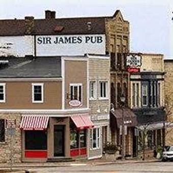 Exterior: The view of Sir James coming down the hill South on 32 - Sir James Pub in Historic Downtown Port Washington - Port Washington, WI Restaurants/Food & Dining