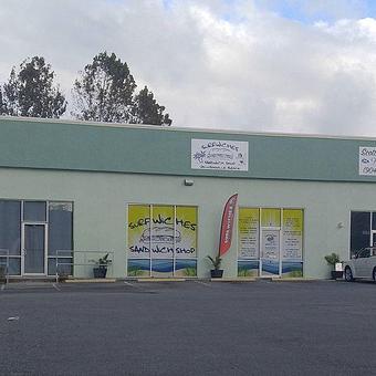 Exterior: Check us out, expanded menu, 12' Steaks & Hoagies. Everything Delicious and prepared to order. - Surfwiches Sandwich Shop in Jacksonville Beach - Jacksonville Beach, FL American Restaurants