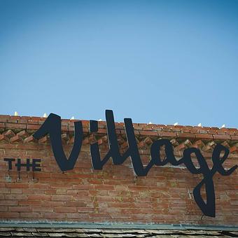 Exterior - The Village Cafe in Downtown Bryan - Bryan, TX American Restaurants