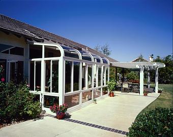 Exterior: Custom curved glass sunroom manufactured by C-Chru Sunrooms Tim Hubbard Construction of Southern Oregon - Tim Hubbard Construction in Wilderville, OR Builders & Contractors