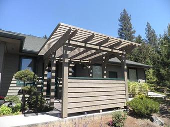 Exterior: Cedar pergola stained with Sherwin Williams solid pigment stain By Tim Hubbard Construction of Southern Oregon - Tim Hubbard Construction in Wilderville, OR Builders & Contractors