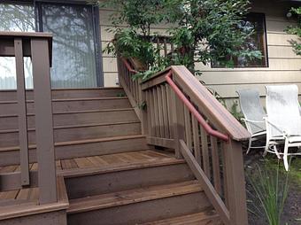 Exterior: Composite deck with wood rail By Tim Hubbard Construction of Southern Oregon - Tim Hubbard Construction in Wilderville, OR Builders & Contractors